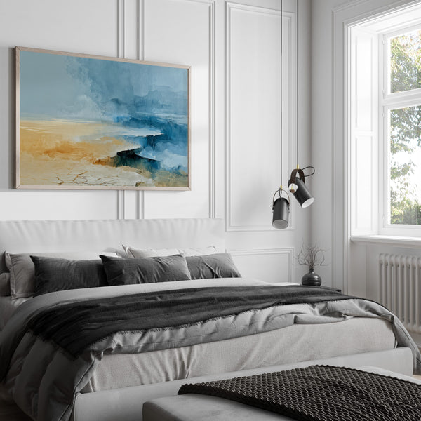 Abstract coastal artwork with layered blue waves, textured ivory forms and a warm golden shoreline.