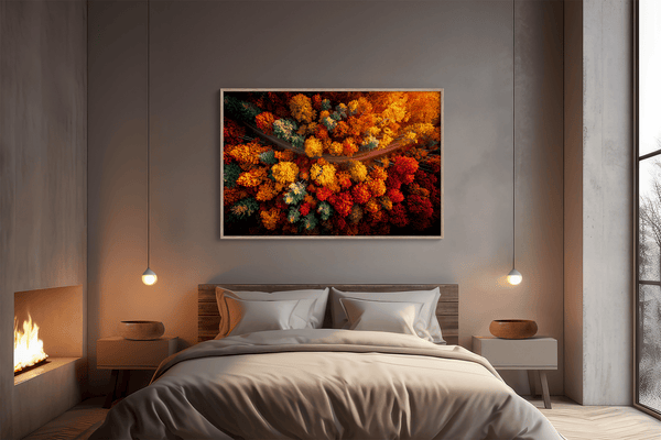 Canvas wall art of an autumn forest from above in crimson, gold, and flame hues. A vibrant seasonal landscape print. Ready to hang.