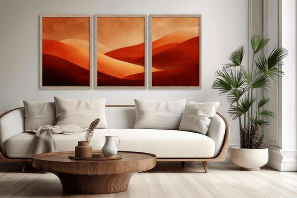 Framed desert sunset triptych wall art in warm red and amber tones. A soft, minimalist watercolour print that brings warmth and calm.
