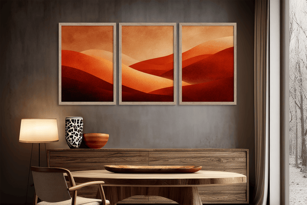 Framed desert sunset triptych wall art in warm red and amber tones. A soft, minimalist watercolour print that brings warmth and calm.