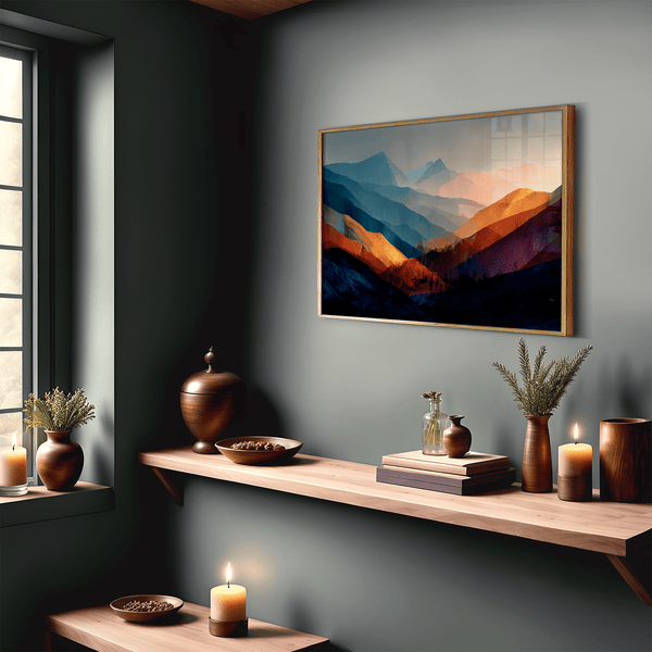 Framed wall art of layered mountains in twilight tones. Deep blues and sienna hues bring bold calm.