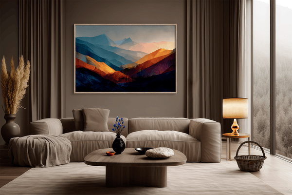 Framed wall art of layered mountains in twilight tones. Deep blues and sienna hues bring bold calm.