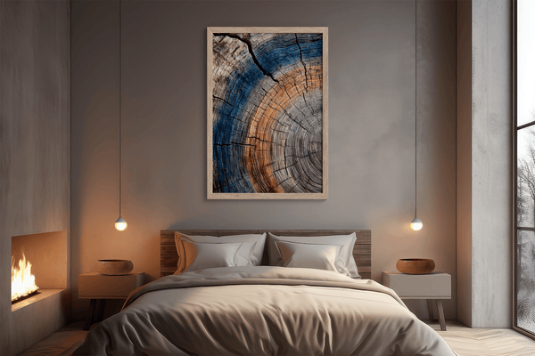 Framed fine art print of tree ring textures in warm browns and cool blues. A striking, timeless piece of nature-inspired wall art.
