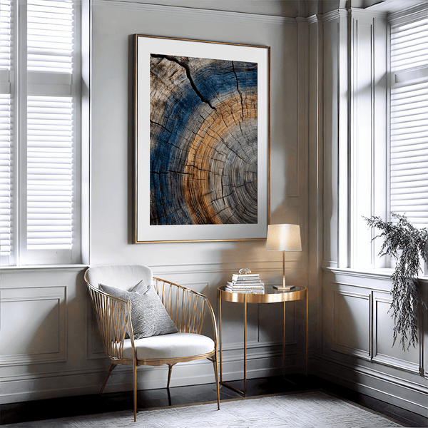 Framed fine art print of tree ring textures in warm browns and cool blues. A striking, timeless piece of nature-inspired wall art.