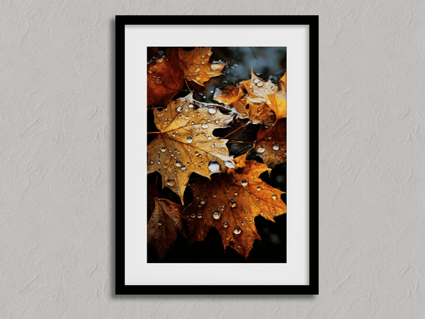 Framed wall art of crimson, amber, and sienna maple leaves with glistening droplets. A radiant autumn foliage print. Ready to hang.