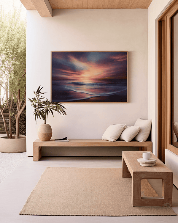 Canvas wall art of a tranquil beach at sunset in warm orange, pink, and purple tones. A calming golden hour print, ready to hang.