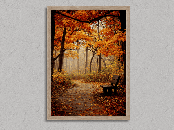 Framed wall art of a golden autumn forest path with light filtering through the trees. A serene woodland print. Ready to hang.