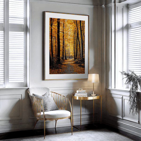 Framed wall art of a golden autumn forest path bathed in amber light. A tranquil seasonal woodland print. Ready to hang.