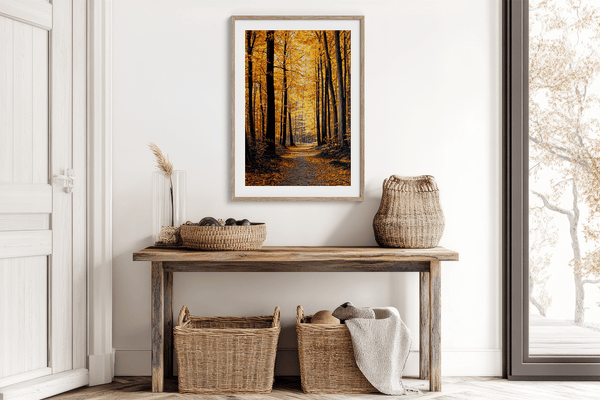Framed wall art of a golden autumn forest path bathed in amber light. A tranquil seasonal woodland print. Ready to hang.