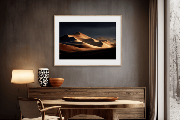 Framed desert wall art of glowing dunes at sunset. A fine art print capturing solitude, contrast, and the quiet beauty of golden light.