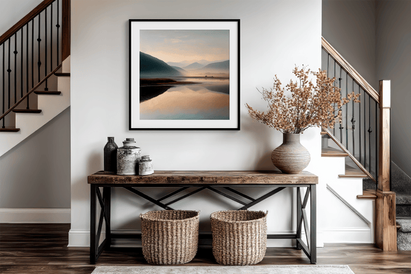 Framed wall art of a misty morning river winding through soft-hued mountains. A tranquil landscape print. Ready to hang.