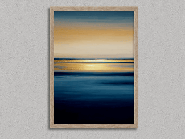Framed wall art of an ocean sunset in coral, peach, and blue tones. A timeless abstract seascape print. Ready to hang.