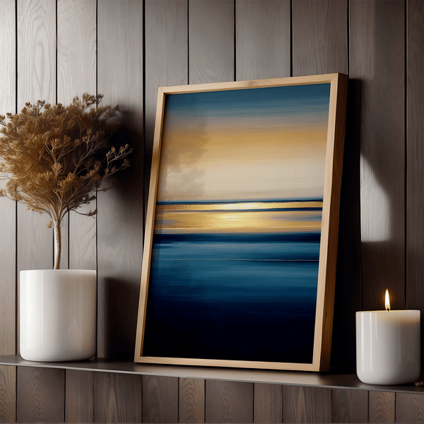 Framed wall art of an ocean sunset in coral, peach, and blue tones. A timeless abstract seascape print. Ready to hang.