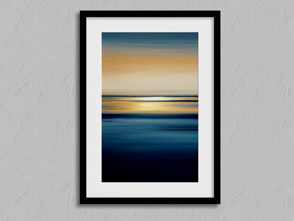 Framed wall art of an ocean sunset in coral, peach, and blue tones. A timeless abstract seascape print. Ready to hang.