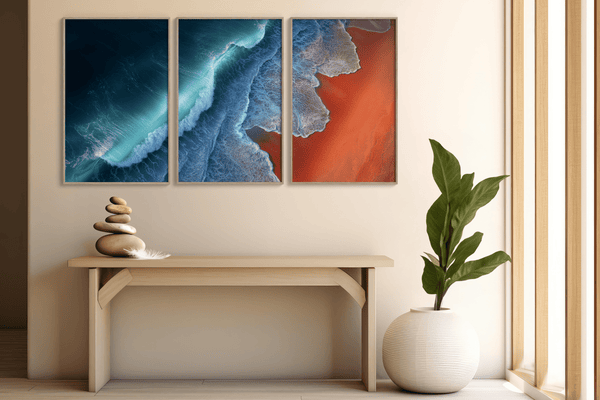Coastal triptych framed wall art of teal waves and sienna sands. Framed or unframed ocean prints for serene, modern interiors.