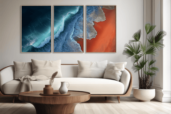 Coastal triptych framed wall art of teal waves and sienna sands. Framed or unframed ocean prints for serene, modern interiors.