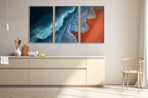 Coastal triptych framed wall art of teal waves and sienna sands. Framed or unframed ocean prints for serene, modern interiors.