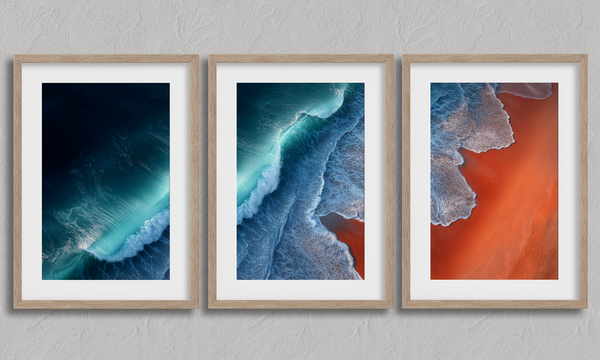 Coastal triptych framed wall art of teal waves and sienna sands. Framed or unframed ocean prints for serene, modern interiors.
