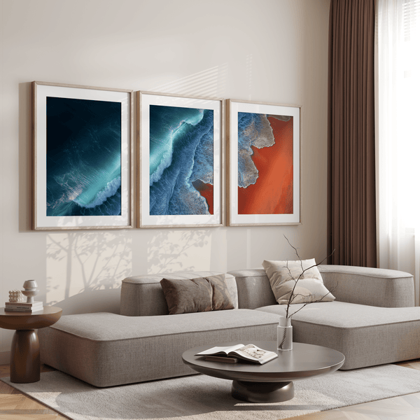 Coastal triptych framed wall art of teal waves and sienna sands. Framed or unframed ocean prints for serene, modern interiors.