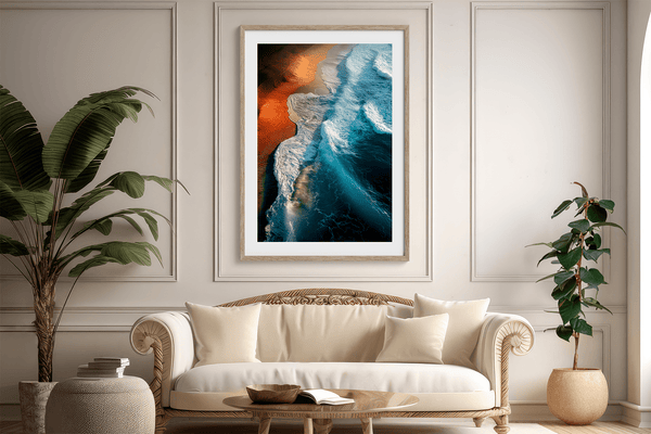 Framed coastal ocean print with teal waves and warm sands. A tranquil, gallery-quality wall art piece. Ready to hang