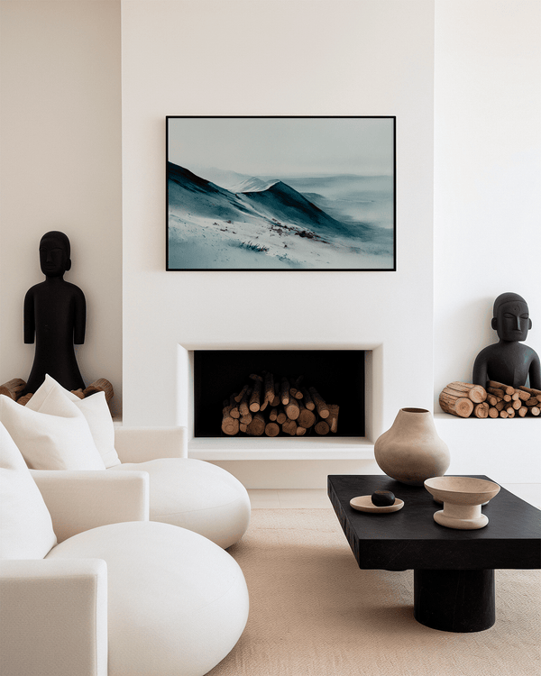 Framed canvas wall art of snowy peaks in soft watercolour blues and greys. A calm, minimalist mountain print. Ready to hang.