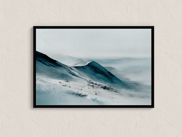 Framed canvas wall art of snowy peaks in soft watercolour blues and greys. A calm, minimalist mountain print. Ready to hang.
