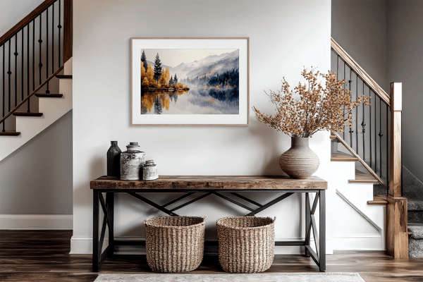 Framed wall art of a calm river reflecting golden trees and hills. An autumnal piece full of stillness and warmth. Ready to hang.