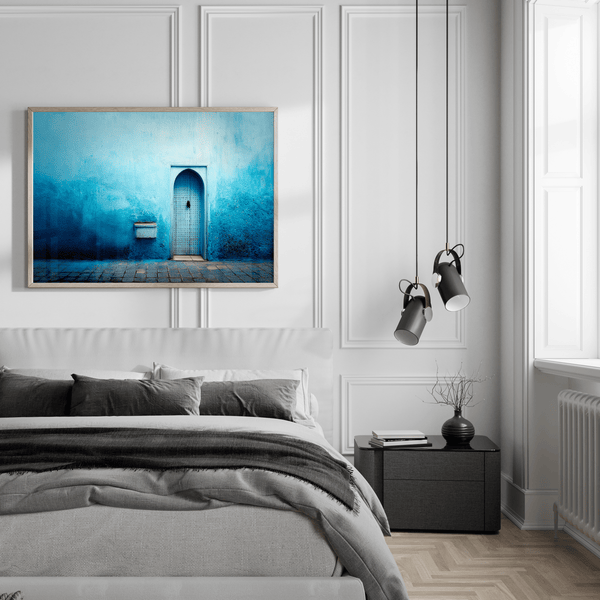 Framed fine art print of a Moroccan blue doorway. Minimalist travel-inspired wall art full of calm, texture, and timeless charm.