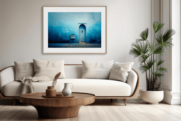 Framed fine art print of a Moroccan blue doorway. Minimalist travel-inspired wall art full of calm, texture, and timeless charm.