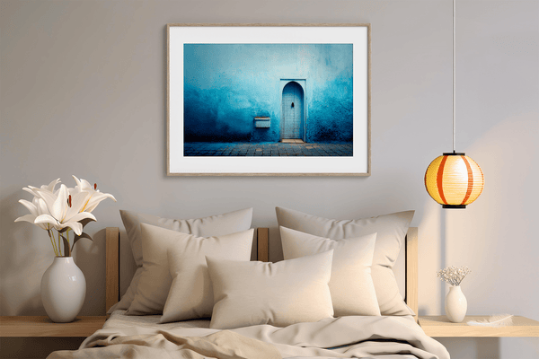 Framed fine art print of a Moroccan blue doorway. Minimalist travel-inspired wall art full of calm, texture, and timeless charm.