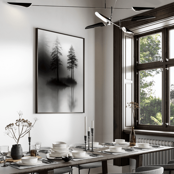 Framed wall art of two lone pines reflected in misty waters. A monochrome forest print evoking solitude and calm. Ready to hang.
