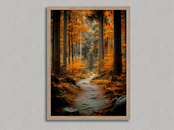 Framed wall art of an autumn woodland path with tall pines and golden leaves. A tranquil seasonal forest print. Ready to hang.