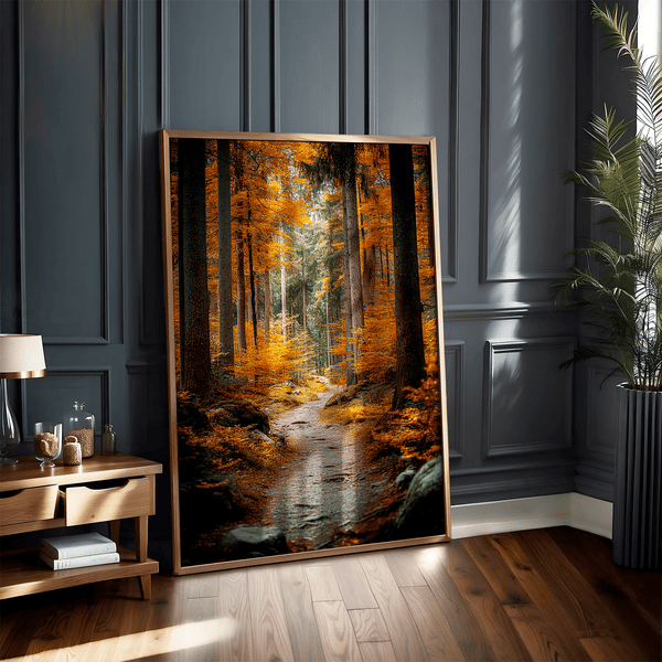 Framed wall art of an autumn woodland path with tall pines and golden leaves. A tranquil seasonal forest print. Ready to hang.