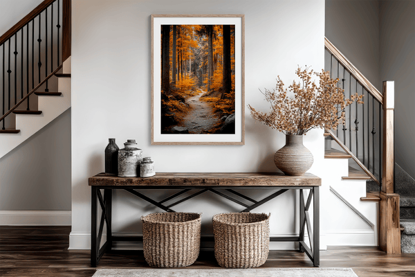 Framed wall art of an autumn woodland path with tall pines and golden leaves. A tranquil seasonal forest print. Ready to hang.