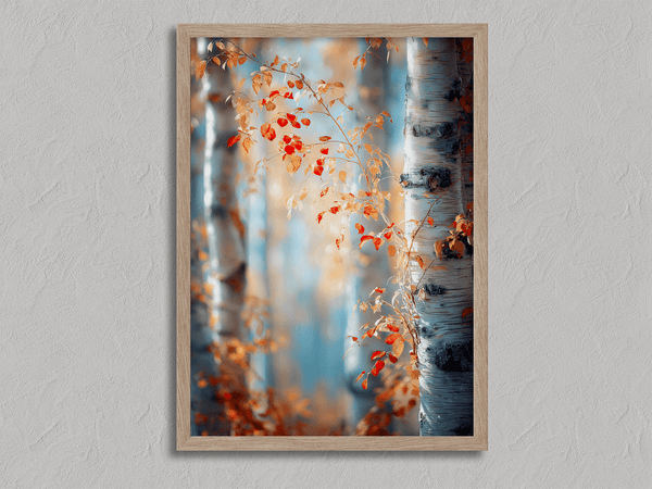 Framed wall art of birch trees in soft autumn light. Crimson and amber leaves drift in golden calm. A tranquil seasonal print.