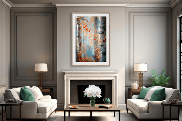 Framed wall art of birch trees in soft autumn light. Crimson and amber leaves drift in golden calm. A tranquil seasonal print.