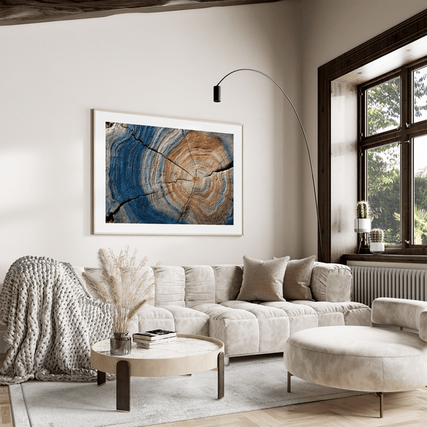 Framed fine art print of tree rings in horizontal view. A textured wall artwork that captures the memory and rhythm of the earth.