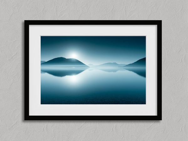 Blue mountain lake print with white mat in a black frame against a textured gray wall.