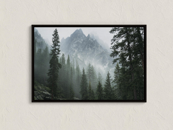 Canvas wall art of alpine evergreens and misty mountains. A tranquil landscape print that brings calm and nature indoors. Ready to hang.