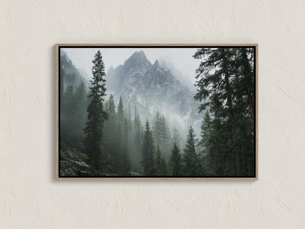 Canvas wall art of alpine evergreens and misty mountains. A tranquil landscape print that brings calm and nature indoors. Ready to hang.