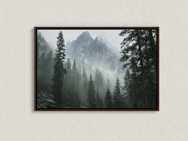 Canvas wall art of alpine evergreens and misty mountains. A tranquil landscape print that brings calm and nature indoors. Ready to hang.