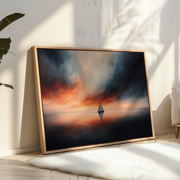 Canvas wall art of a sailboat at sunset with stormy skies. A dramatic ocean print balancing calm and intensity. Ready to hang.