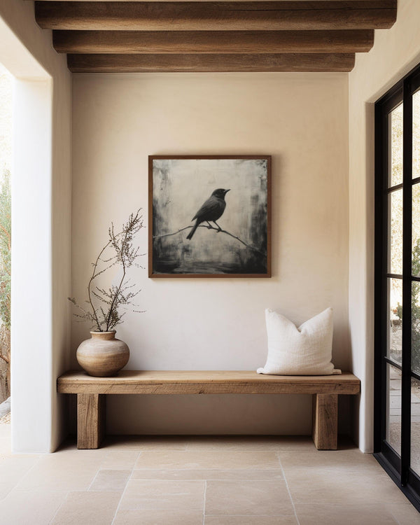 Canvas wall art of a solitary blackbird on a wintry branch. A peaceful monochrome bird print, ready to hang.