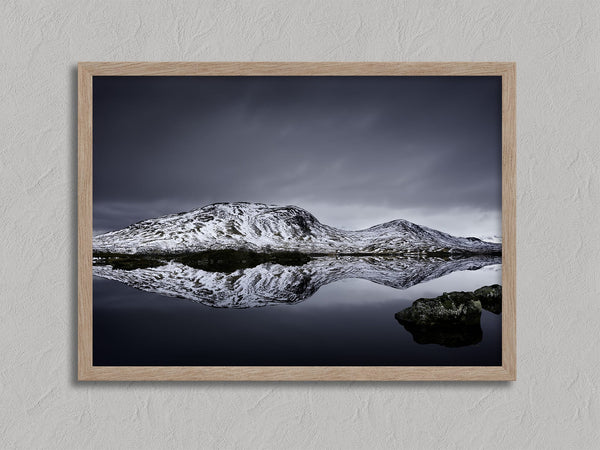 Silent Mirror shown in an oak frame without a border or mount.