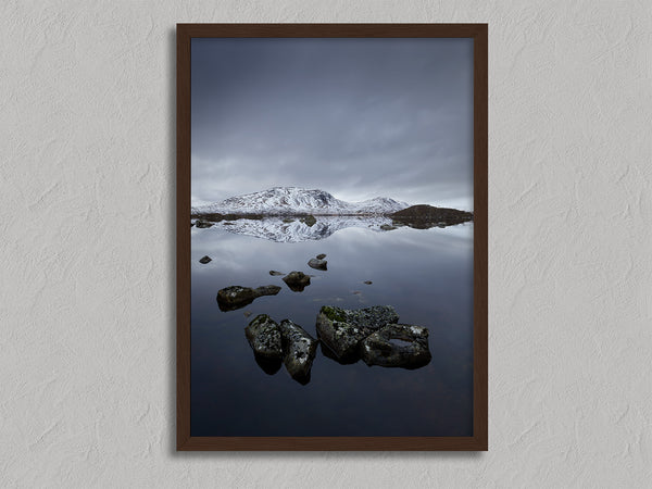 Quiet Reflections shown in a walnut frame without a border or mount.