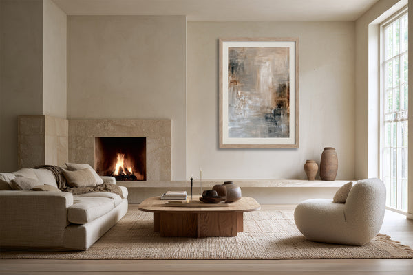 Quiet Layers II in a light frame above a fireplace in a neutral living area.