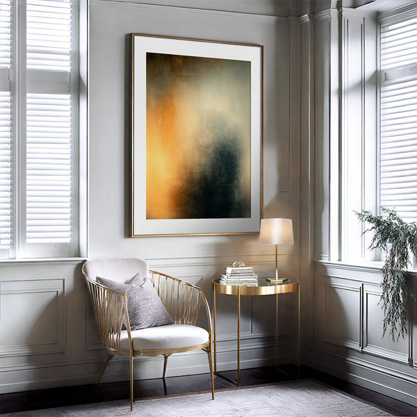 Copper Veil in a thin gold frame above a woven chair and small round side table.