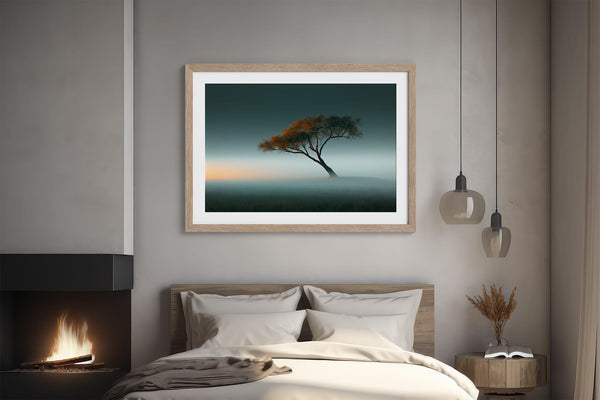Lone orange autumn tree leaning through mist beneath a soft teal sky.