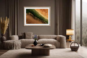 A framed landscape art print featuring a green and orange canyon scene