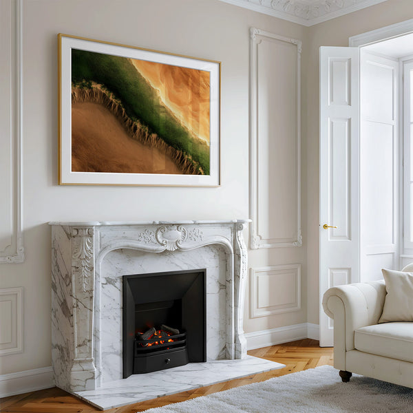 A framed landscape art print featuring a green and orange canyon scene